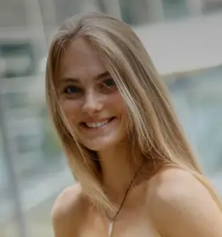 Cliente Stepcoaching satisfaite après transformation physique